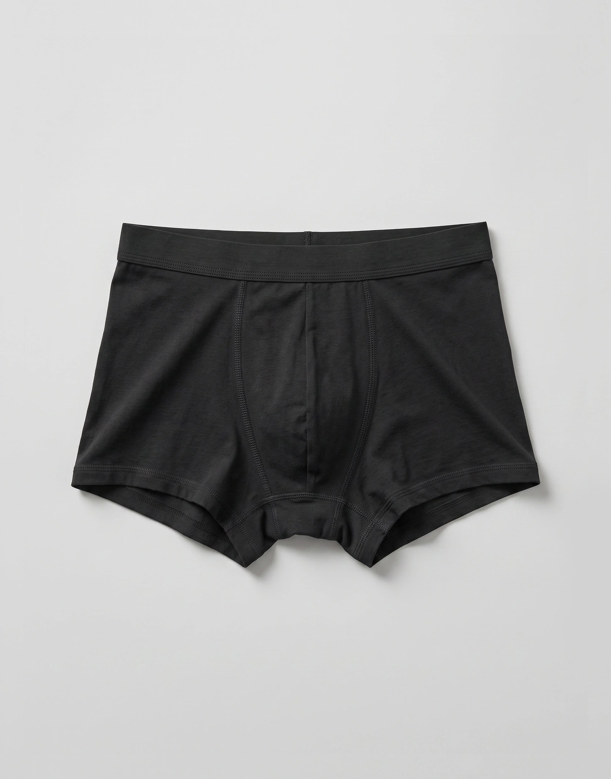 Black boys' organic cotton trunks made from 100% GOTS-certified organic cotton.
