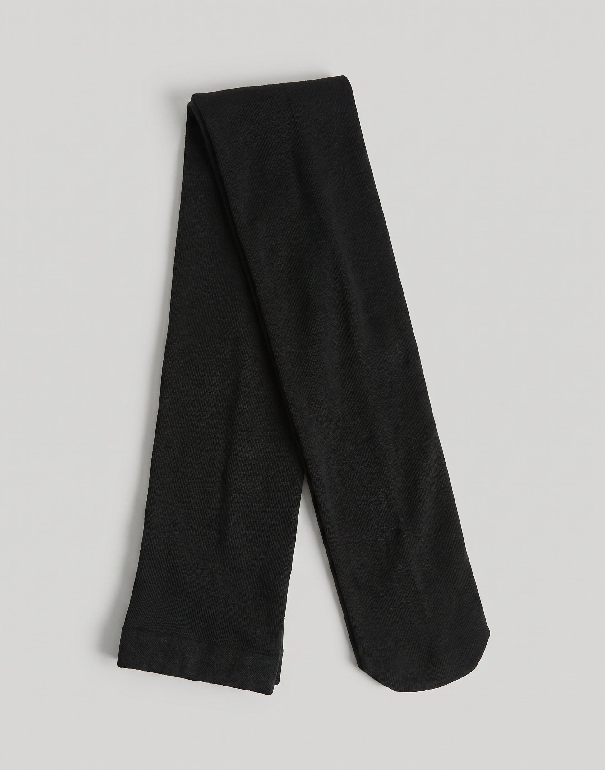 Black fine knit organic cotton tights made from GOTS-certified organic cotton.