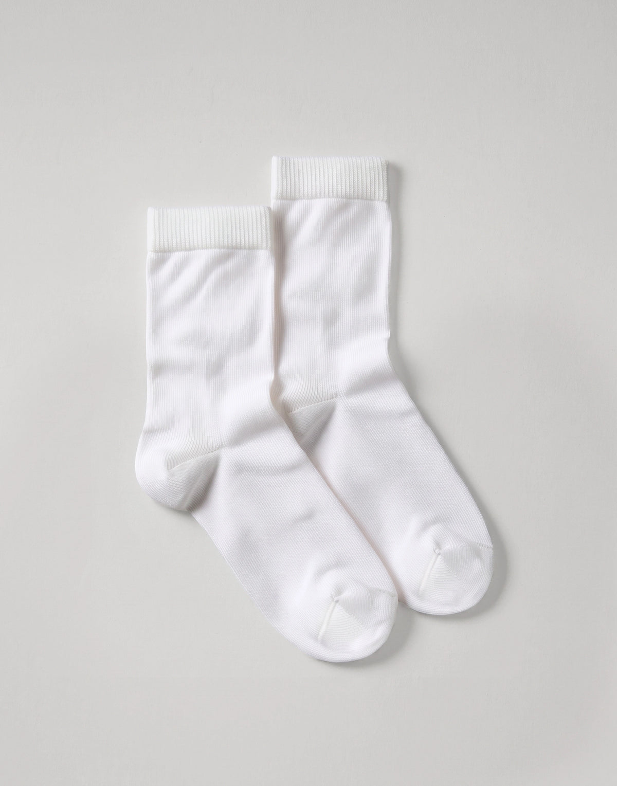 White organic cotton ankle socks made from GOTS-certified organic cotton.