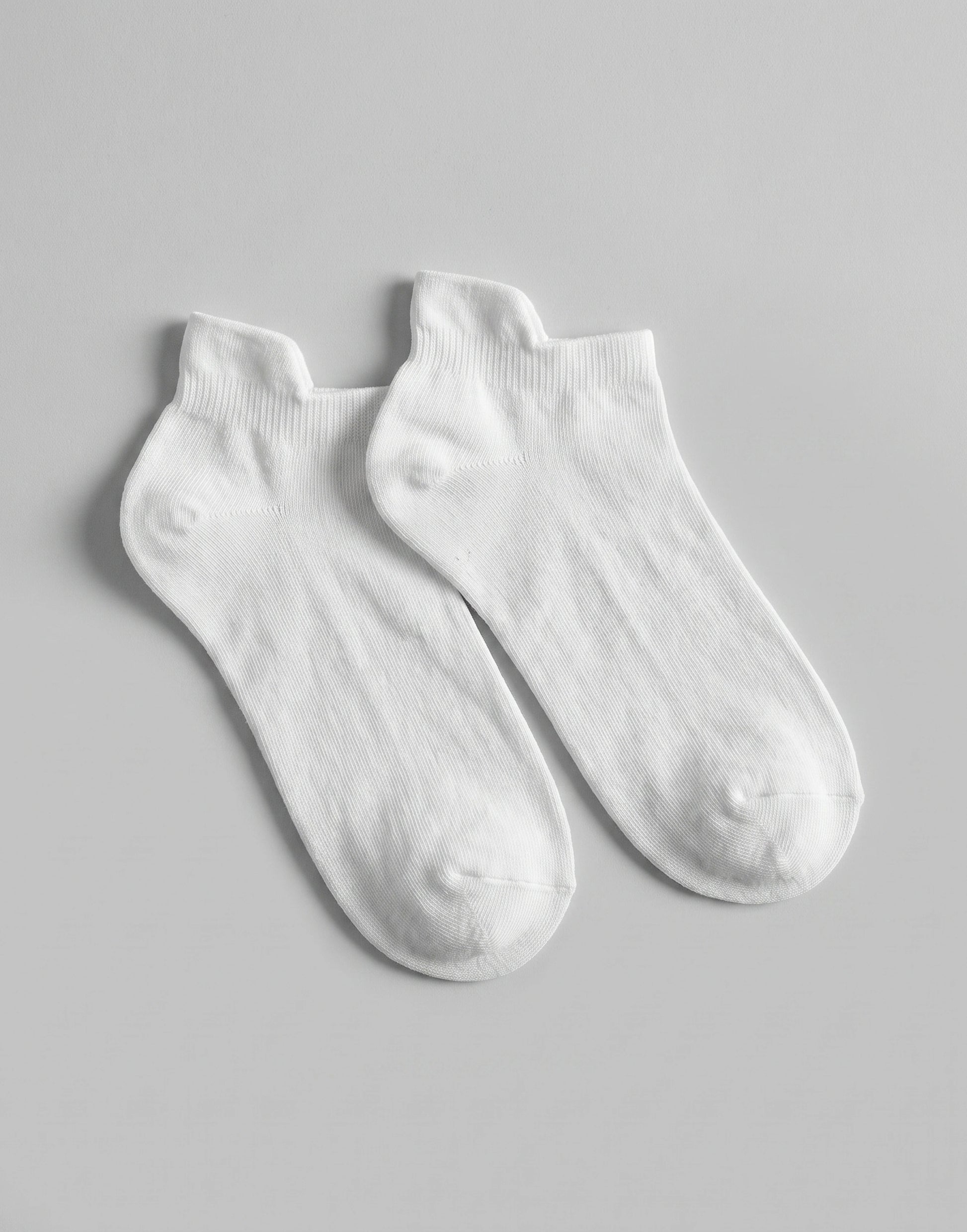 Organic cotton ankle sports socks with a cushioned terry sole, made from GOTS-certified organic cotton.