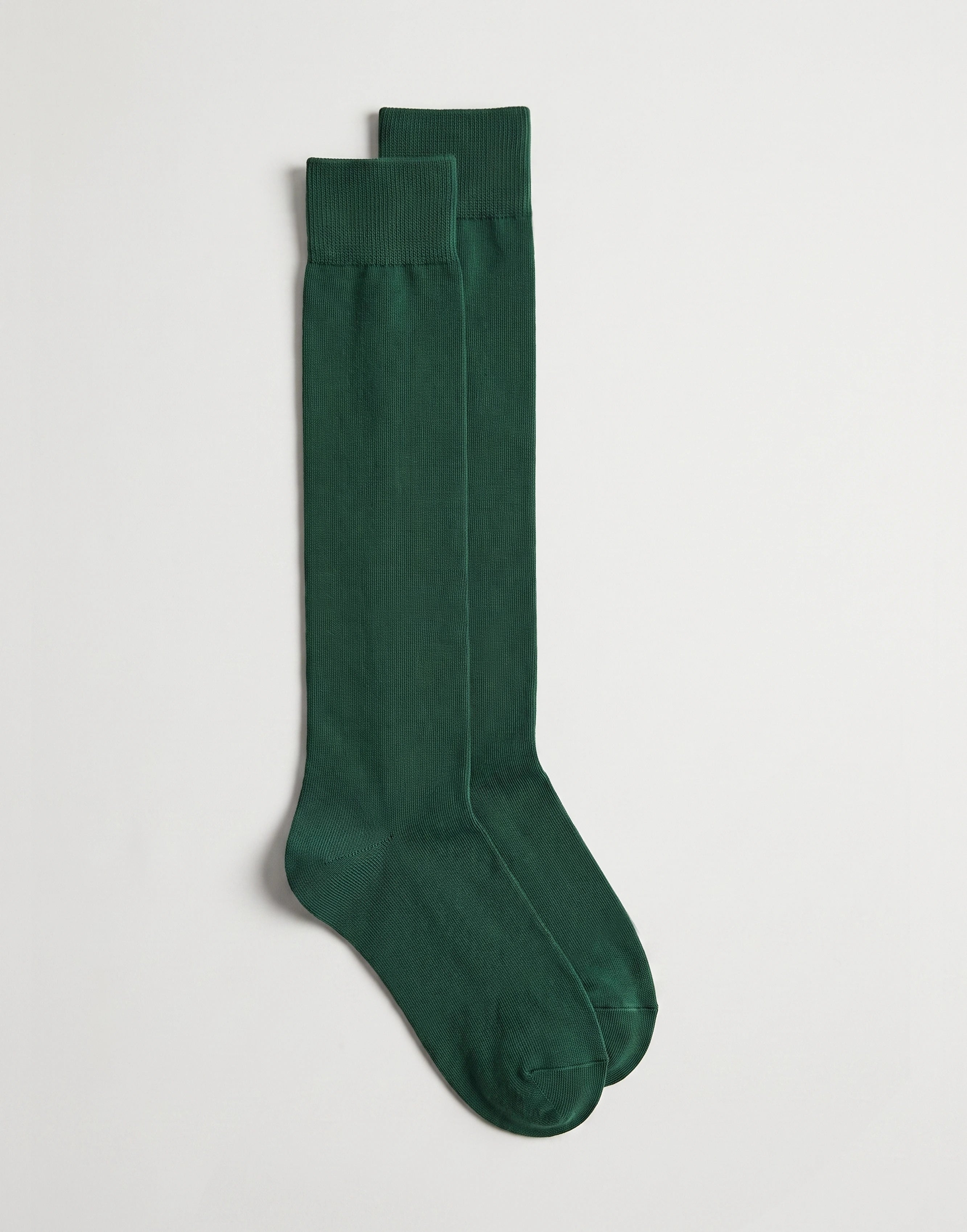 Bottle green organic cotton knee-high school socks made from GOTS-certified organic cotton.