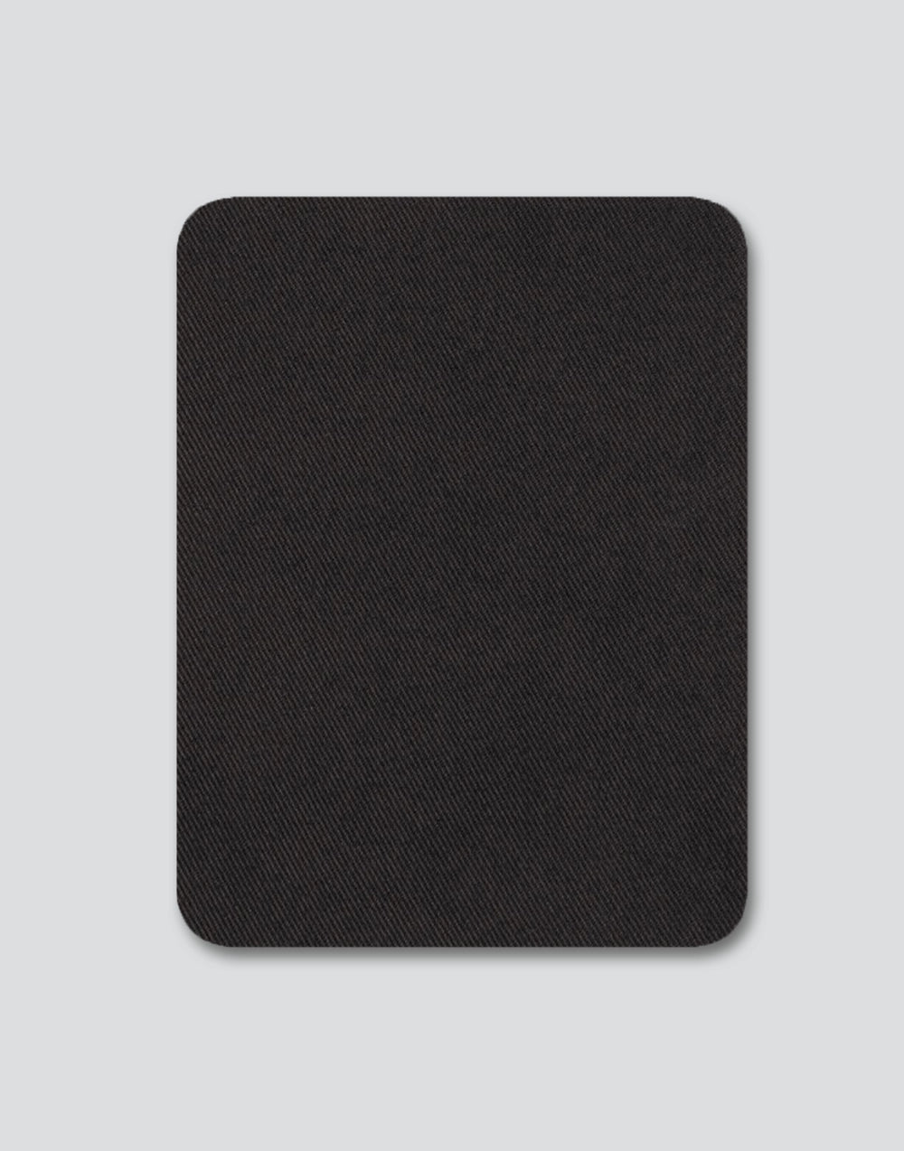 Organic cotton knee repair patch sewn onto school trousers