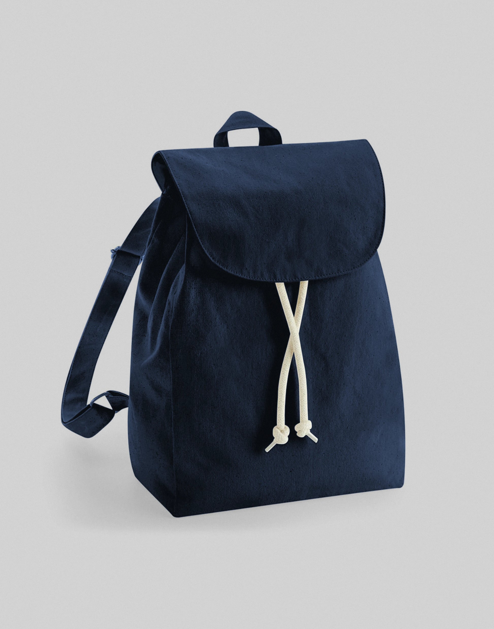 A navy blue canvas backpack with a top flap, adjustable shoulder strap, and cream-colored drawstring closure, shown on a neutral light gray background.