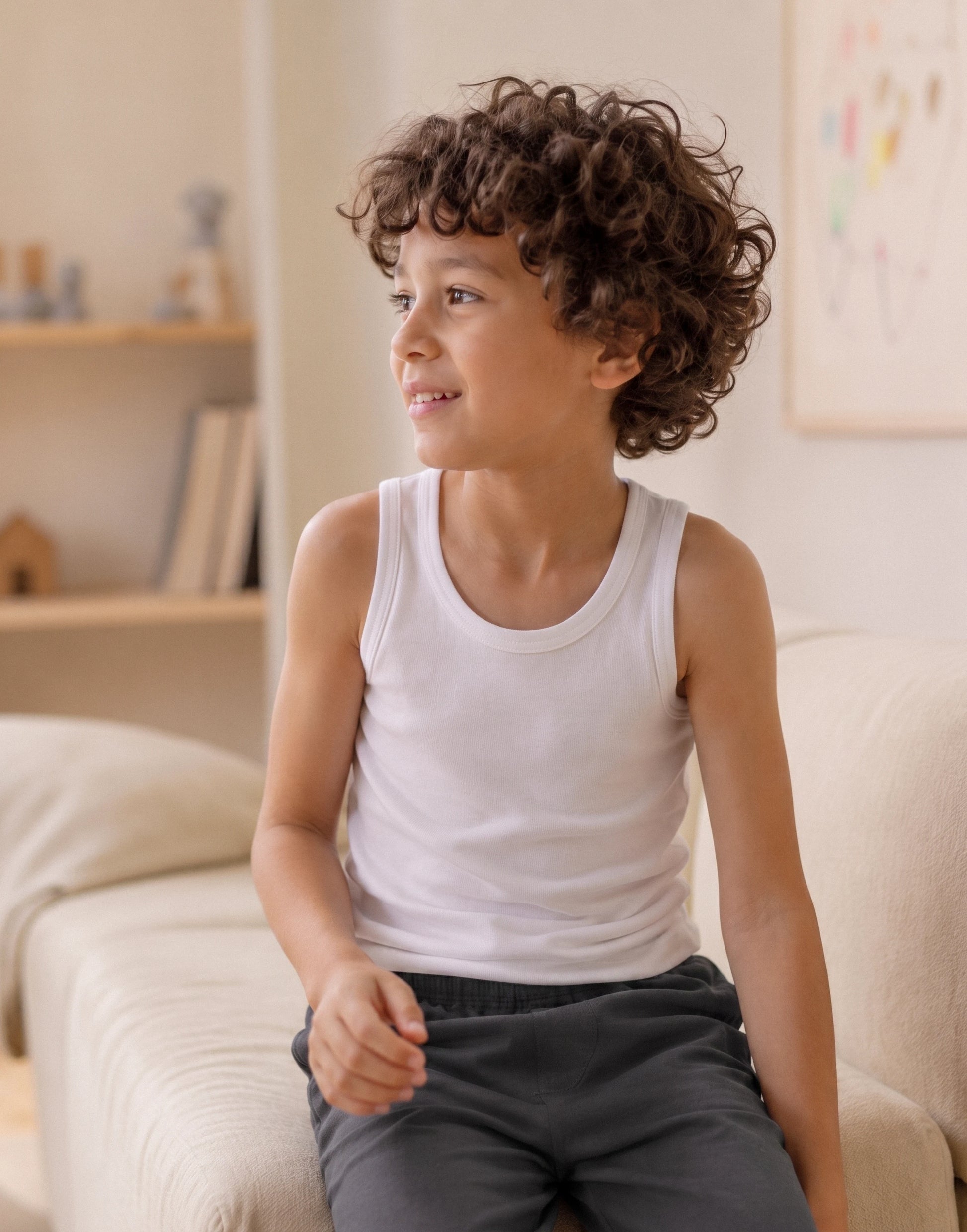 White unisex organic cotton vest made from 100% GOTS-certified organic cotton.